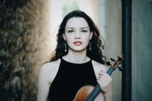 Mairéad Hickey posing with her violin