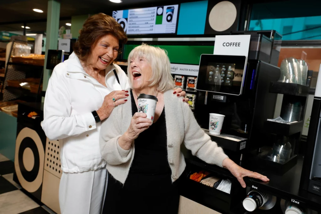 Veronica Campbell of Bewley’s and Bernie Wright, founder and director of Wrights of Howth enjoy the new coffee experience in Wrights Food Fayre at Dublin Airport. Pic: Conor McCabe Photography